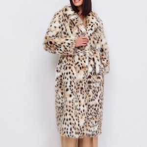 Detail of leopard print faux fur coat showing plush texture and stylish lapel design