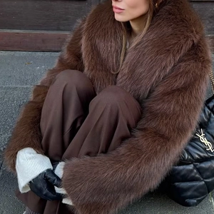Detail of luxurious faux fur coat with plush collar and premium synthetic texture