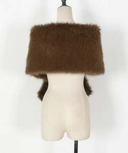 Detail of plush brown faux fur shawl highlighting its thick texture and dense fibers