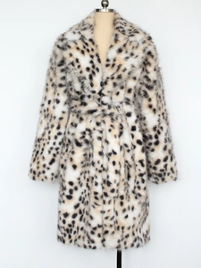 Close-up detail of leopard print faux fur coat texture and lapel design on white background