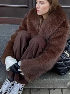 Women's dark brown faux fur coat with oversized lapel and loose fit for winter street style