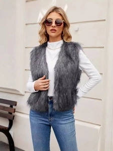 Women's dark gray faux fur vest with V-neck design and soft fluffy texture for styling