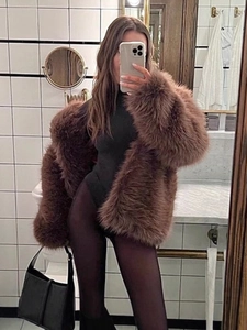 Women's faux fox fur coat in dark brown with thick plush texture for winter style