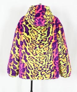 Macro detail of thick faux fur texture with neon green and purple leopard print jacket