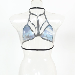 Detail of blue camouflage halter bralette with criss-cross straps on a mannequin