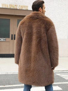 Back view of brown faux fur coat showing thick plush texture and luxury long hair material