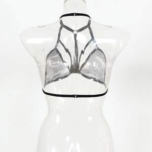Detailed view of a black sheer mesh halter bralette with geometric strap design