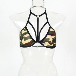 Detail view of camouflage bikini top with crisscross halter straps and frame design