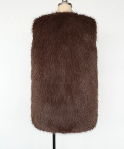 Detailed back view of a dark brown long hair faux fur vest showing dense fluffy texture