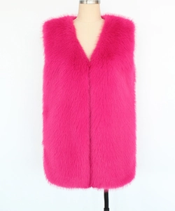 Detail of rose red faux fur vest featuring a V-neckline and soft shaggy long hair texture
