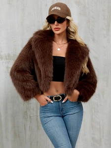 Detail view of women's short faux fur jacket in dark brown with elegant wide collar