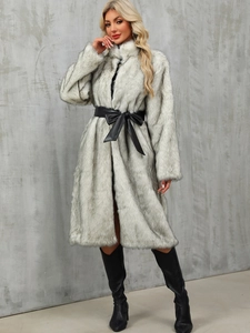 Long faux fur coat in light grey with a black leather belt and a high-neck design