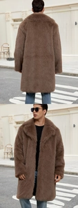 Detail view of brown faux fox fur long coat for men with large lapels in a street style