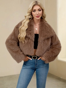 Detail shot of brown faux fur jacket with large lapel and soft plush texture