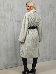 Detail of grey faux fur coat featuring a cinched waist with a black leather belt