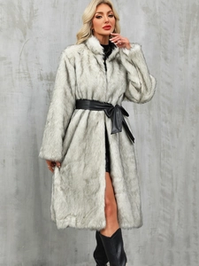 Detail of grey faux fur coat with black tipping, stand collar and leather waist belt