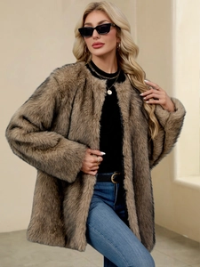 Detailed macro texture of brown faux fur coat showing thick warm synthetic long plush fibers