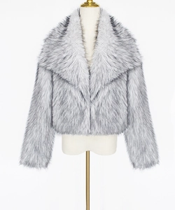 Detailed texture of grey-white faux fur cropped coat with large turnover collar