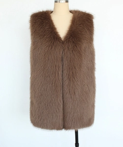 Detail showing the fluffy texture and V-neckline of a brown faux fur long vest