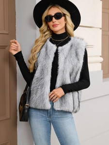 Detail of light grey faux fur vest with open front design for autumn winter layering