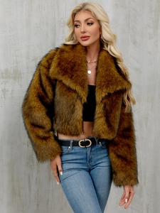 Detailed view of brown faux fur jacket showing thick texture and stylish wide lapels