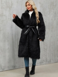 Elegant black faux fur long coat with stand collar and matte leather belt for women