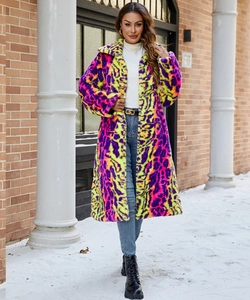 Detailed texture of vibrant purple and green faux fur leopard print on long coat