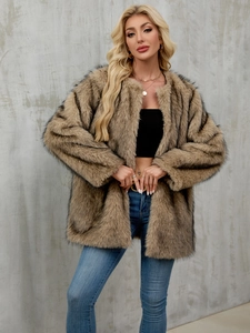 Detailed texture of mid-length faux fur coat with brown and black highlights
