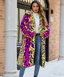 Detailed plush texture of women's long faux fur coat with vibrant neon leopard print