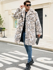 Detail of men's faux fur leopard print coat with a large lapel and thick texture