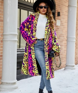 Detailed view of long faux fur coat with vibrant purple and green leopard print
