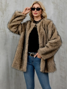 Detailed macro view showing the soft texture and fibers of this brown faux fur coat