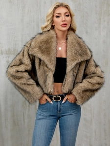 Detail of faux fur collar and texture on a short brown faux fur jacket for women