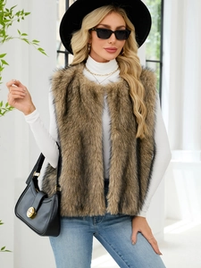Detail showing the fluffy texture and rich brown tones of the faux fur vest