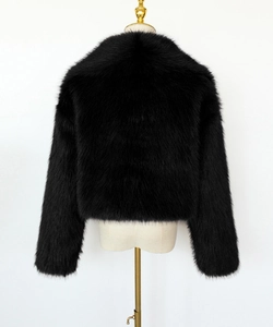 Detailed back view of women's short faux fur jacket in black with plush fluffy texture