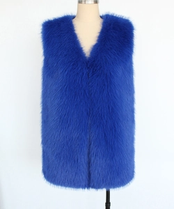 Detailed view of Royal Blue long hair faux fur vest with deep V-neckline on mannequin