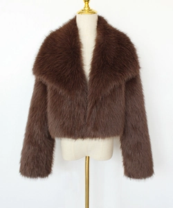 Close-up of deep brown faux fur jacket featuring plush texture and wide lapel collar