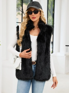 Chic black faux fox fur vest with stand collar, perfect for stylish autumn layering