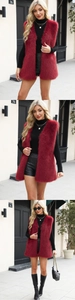 Detailed view of luxury long faux fox fur vest in dark red with premium plush texture
