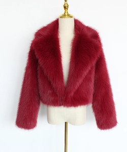Close-up of the plush faux fur texture and wide collar on this wine red short jacket