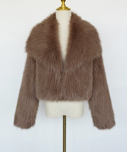 Detail of soft brown faux fur texture and lapel design on short winter coat