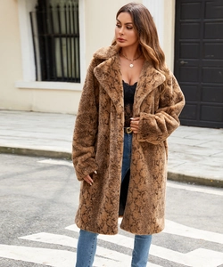 Detailed view of plush faux fur texture and stylish snakeskin pattern on women's winter coat