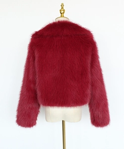 Back view of a deep red faux fur jacket with plush texture on a white background