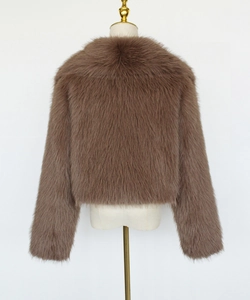 Back view of a cropped brown faux fur jacket showing plush texture on a mannequin