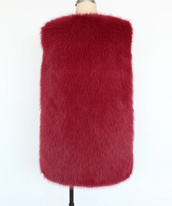 Detail view showing the back of a deep red faux fur vest with long dense synthetic hair