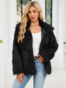 Women's black faux fur jacket with fluffy texture and open front styling for winter fashion