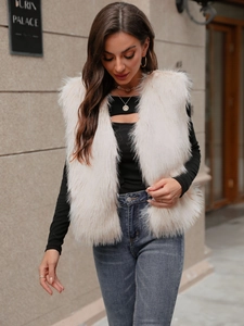 Women's faux fur vest in light apricot, sleeveless fluffy stylish waistcoat for winter