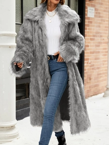 Elegant long grey faux fur coat for women with oversized collar in winter street style
