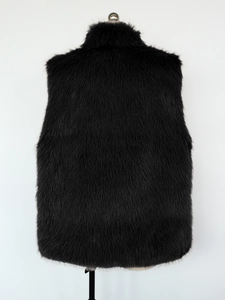 Back view of a fluffy black faux fur vest with a premium stand-up collar design
