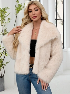 Detail of soft cream faux fur jacket with large lapel and rich plush texture for women